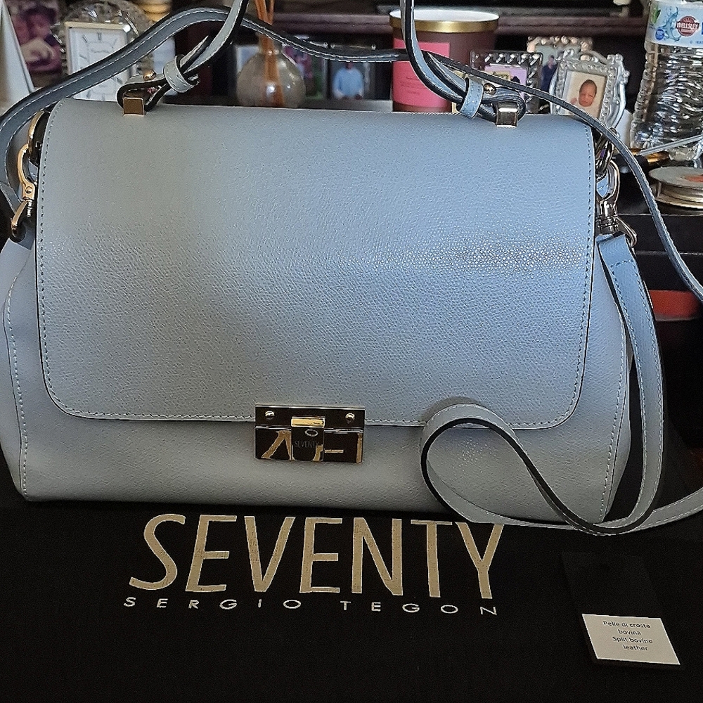 Seventy Sergio Tegon like new blue handbag.
